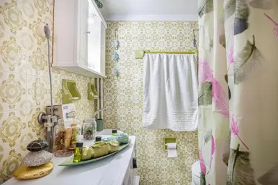 a bathroom with a counter with bananas on it at Katerina's Apartment in Chania Center in Chania Town