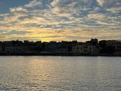 a view of a city from the water at sunset at Casa Livieres in Chania Town
