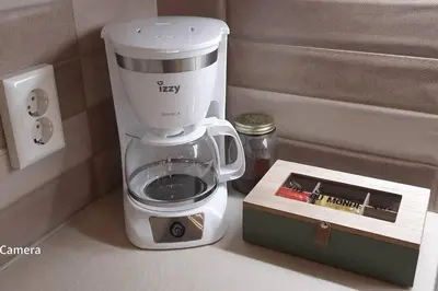 a white blender sitting on a counter next to a box at 4 Guests - Veneris Residence Apartment in Chania in Chania Town