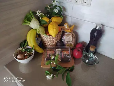 a bunch of fruits and vegetables on a counter at VAMA APARTMENT in Plataniás