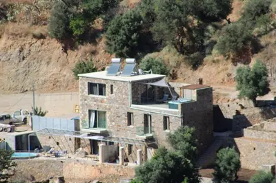 an aerial view of a house under construction at INO III Domus SWIMSPA by Amigdalokefali Elafonissi in AmigdhalokeFálion
