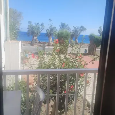 a balcony with a view of the ocean at Zorbas in Sougia