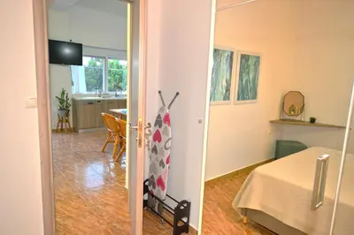a room with a room with a bed and a kitchen at Mpoulakis Apt 46 in Kissamos