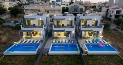 an aerial view of a house with two swimming pools at Katakis LuxuryVillas in Chania Town