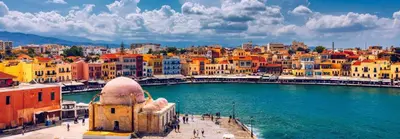 a group of buildings next to a body of water at Valentina's Luxury House in Chania Town