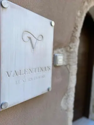 a sign on the side of a building at Valentina's Luxury House in Chania Town
