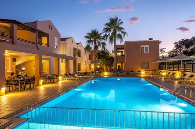 a view of a swimming pool at a resort at Theos Holidays Apartments in Kato Daratso