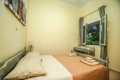 a bedroom with a bed with two towels on it at Apartment close to Balos-Elafonisi and Falasarna! in Kámbos