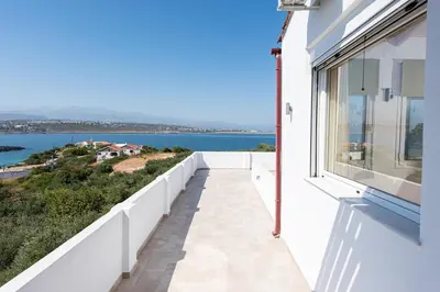 a balcony with a view of the water at Villa Kiara 2 in Tersanas