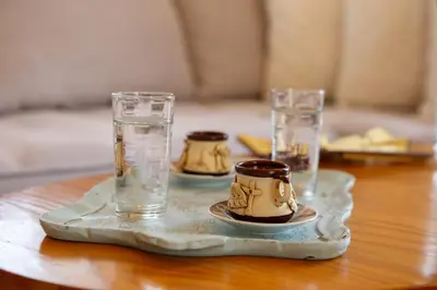 a tray with three glasses on top of a table at Villa 4 DESTINA in Élos