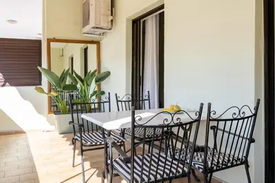 a dining room with a table and chairs at Chania dream apartment in Chania Town
