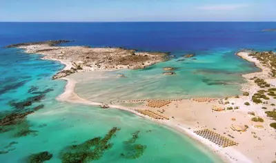 an aerial view of an island in the ocean at Vilitsa Stylianos in Kounoupítsa