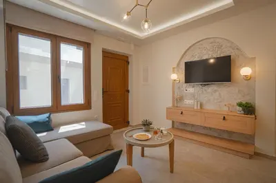 a living room with a couch and a tv at Mezoneta 