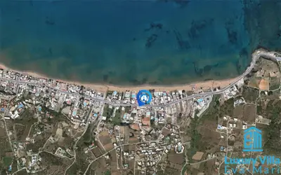 a map of a city with a road and the ocean at Luxury Villa Eva-Mari with jacuzzi, 50m from the beach in Stalos