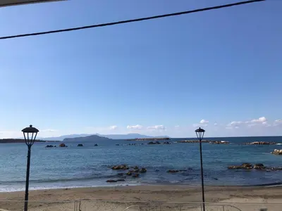 a view of the ocean from the beach at Archin Boutique suites in Chania Town