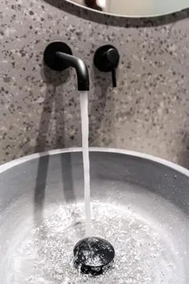 a sink with water coming out of a faucet at Chania Residence - City centre maisonette in Chania Town