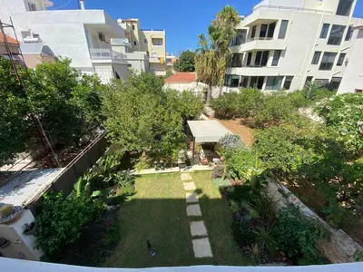 an aerial view of a garden in a building at Saxon's Apartment in Chania Town