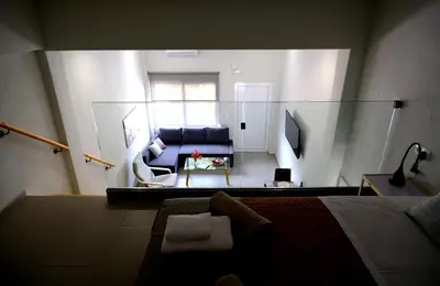a view of a living room with a couch at Erinaki Apartments in Kissamos