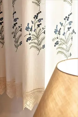 a shower curtain with a blue flower pattern on it at Sclopa The Laography Project in Kolymvari