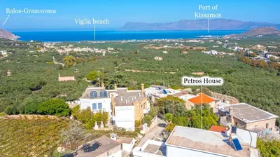 an aerial view of a small town with the ocean at Petros Luxury Traditional House - Villa in Kissamos