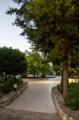 a park with trees and a walkway at Retreat Homes Apokoronas in Douliana