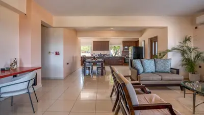 a living room with a couch and a table at Michael's Villa in Kissamos