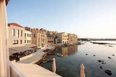 a view of a river with buildings and a city at FOS - casa casa group in Chania Town