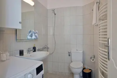 a bathroom with a toilet and a sink at Gavalas Urban Home in Chania Town