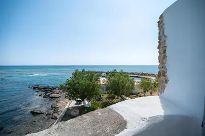 a view of the ocean from a building at Mylos Seaside Experience in Frangokastello
