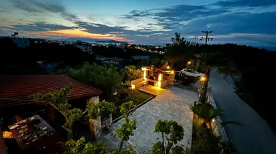 an aerial view of a house at night at Anestis Ioanna Villa in Daratso