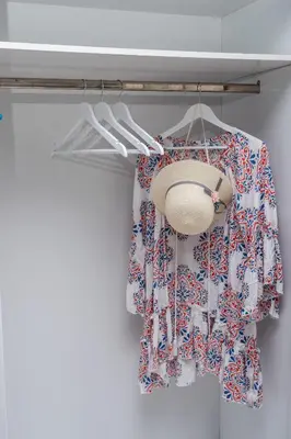 a closet with a curtain and a hat and a light at ''Meraviglia casa'' Ariadne in Kato Daratso