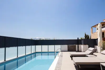 a swimming pool on the roof of a building at VillAgioi - Luxury villas, Private Pools, 450m to the Beach in Chania Town