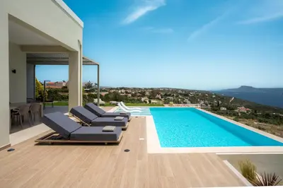 a villa with a swimming pool with a view at Bay Overlook Villa in Korakiaí