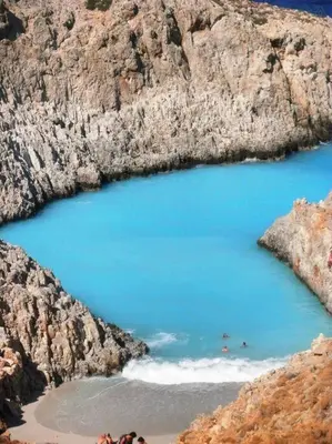 a large body of water in a rocky mountain at Premium, 2-bedroom Apartment! in Chania Town
