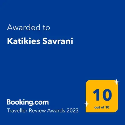 a yellow square with the text awarded to kitties savannah at Katikies Savrani in Perivólia