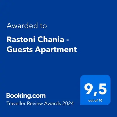 a blue sign with the text awarded toishi china guest appointment at Rastoni Chania - Guests Apartment in Chania Town
