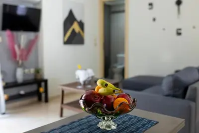 a bowl of fruit on a table in a living room at Callisto in Chania Town