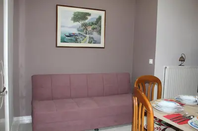 a living room with a couch and a table at Kissamos Nice Apartment2 in Kissamos