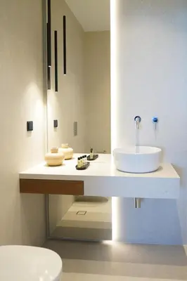 a white bathroom with a sink and a toilet at AGAVE HILL LUXURY HOUSE in Chania Town