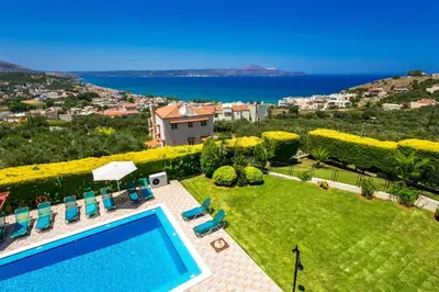 an aerial view of a villa with a swimming pool at Villa Margarita Exi by Villa Plus in Kalyves