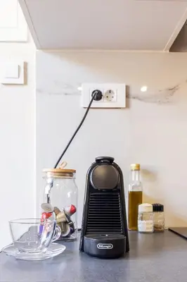 a toaster sitting on a counter in a kitchen at Stef&Art Old Town House in Chania Town