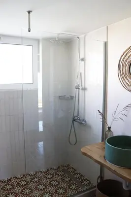 a shower with a glass door in a bathroom at Cassandra's Haven in Kissamos
