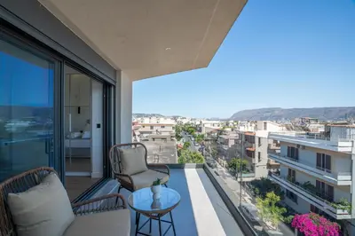 a balcony with a view of a city at Almy Luxury Apartments in Chania Town