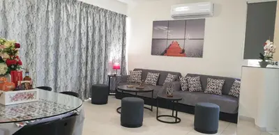 a living room with a couch and a table at Villa Rodo in Pírgos Psilonérou