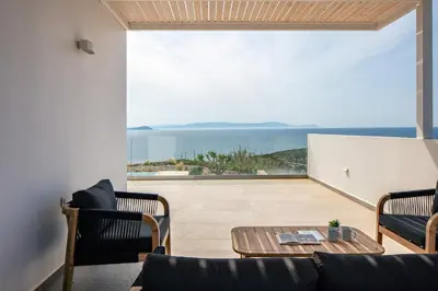 a living room with a view of the ocean at Vista Residence in Chania Town