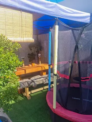 a gazebo with a batting cage in a backyard at Villa Vanessa in Kissamos