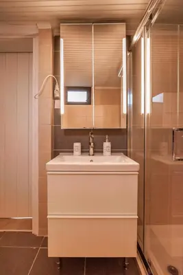a bathroom with a white sink and a shower at Pool Villa Michail, in Kissamos! in Koukounará