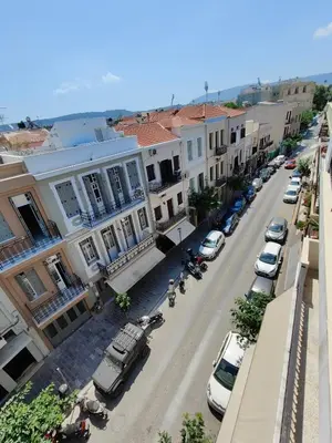 an aerial view of a city street with parked cars at Chania-Limani Splantzia-geada in Chania Town