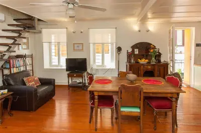 a living room with a table and a couch at History & Culture in Old Town Chania in Chania Town