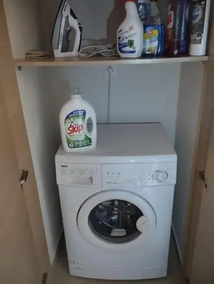 a white washer and dryer in a small room at Zoe's Luxury Home - Private Parking in Chania Town